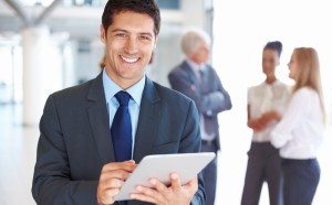 This guy seems pretty happy using his tablet.  He's probably surfing the TechTalk articles and found a funny one.